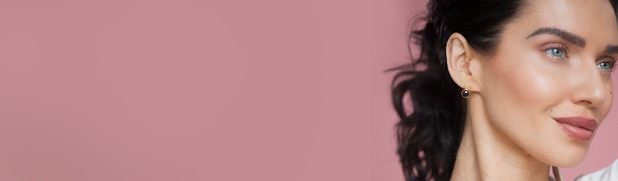 model-wearing-garnet-earrings-from-christin-ranger-january-birthday-gift-collection