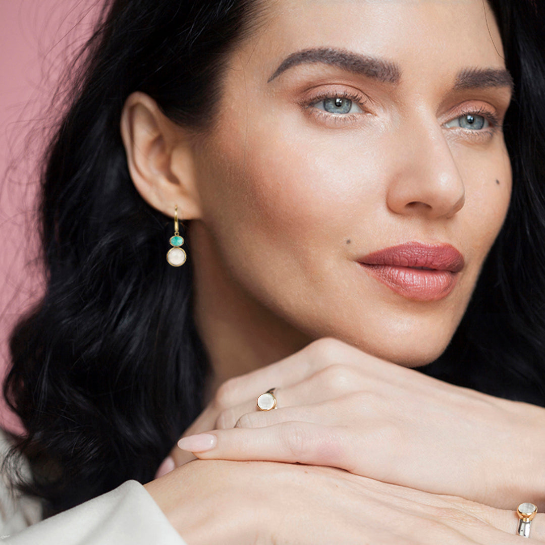 Model wearing natural moonstone and amazonite gemstone jewellery in sterling silver and gold vermeil.