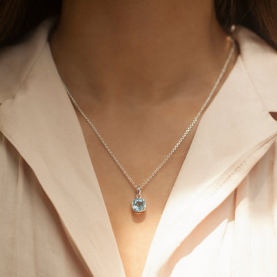 Silver And Natural Blue Topaz Necklace Pendant on Model