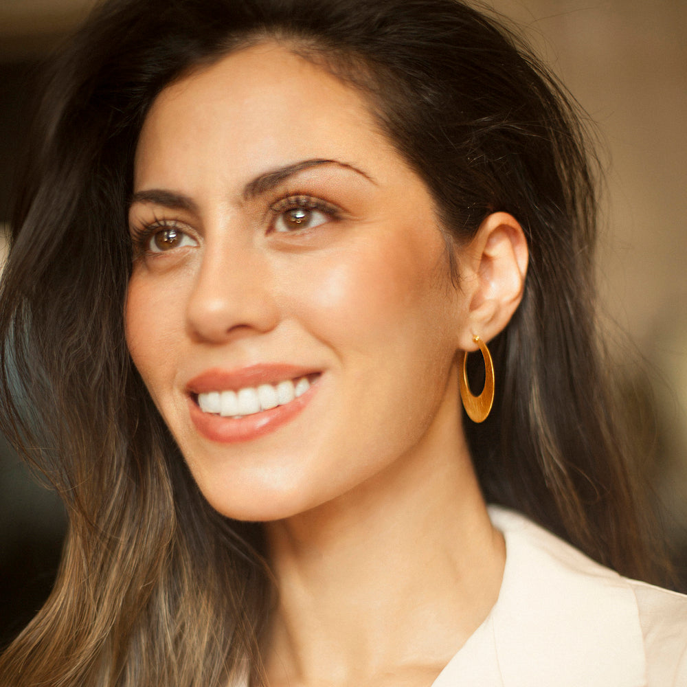 Gold Hoop Earrings With Snap Post on Model