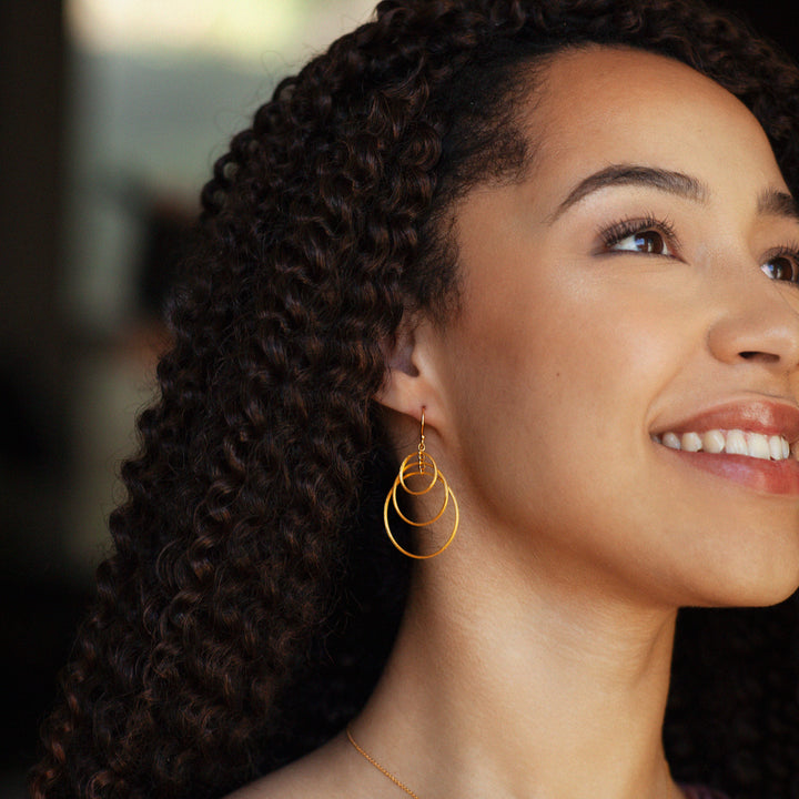 Triple Hoop Gold Earrings on Model