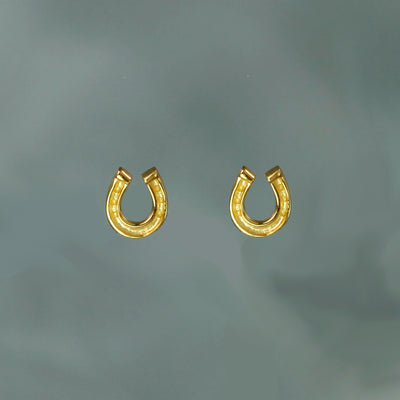 Photo of Mini Gold Horseshoe Stud Earrings