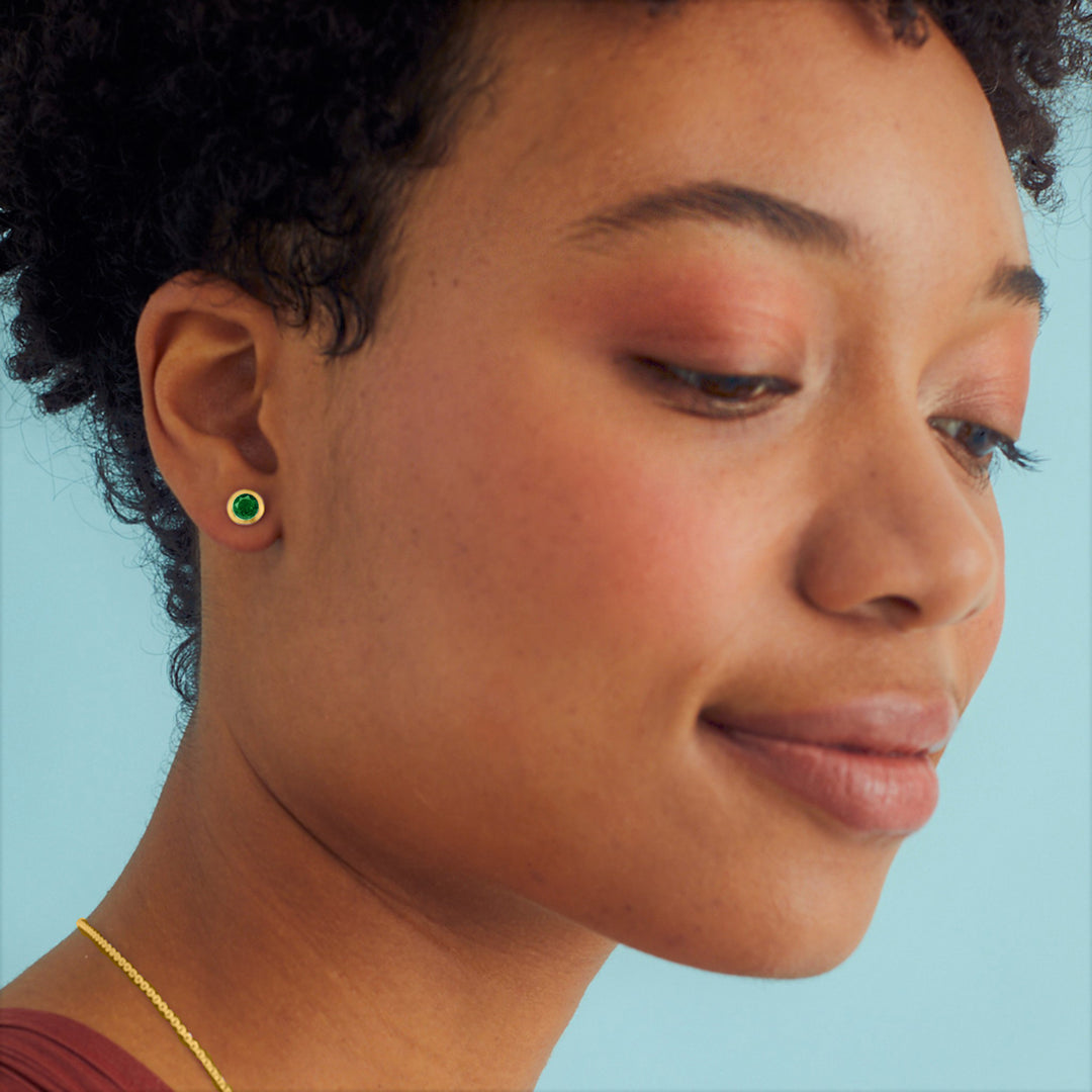 Model Wearing Gold Stud Earrings With Green Quartz