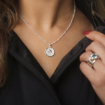 Silver Taurus Zodiac Star Sign Necklace on Model