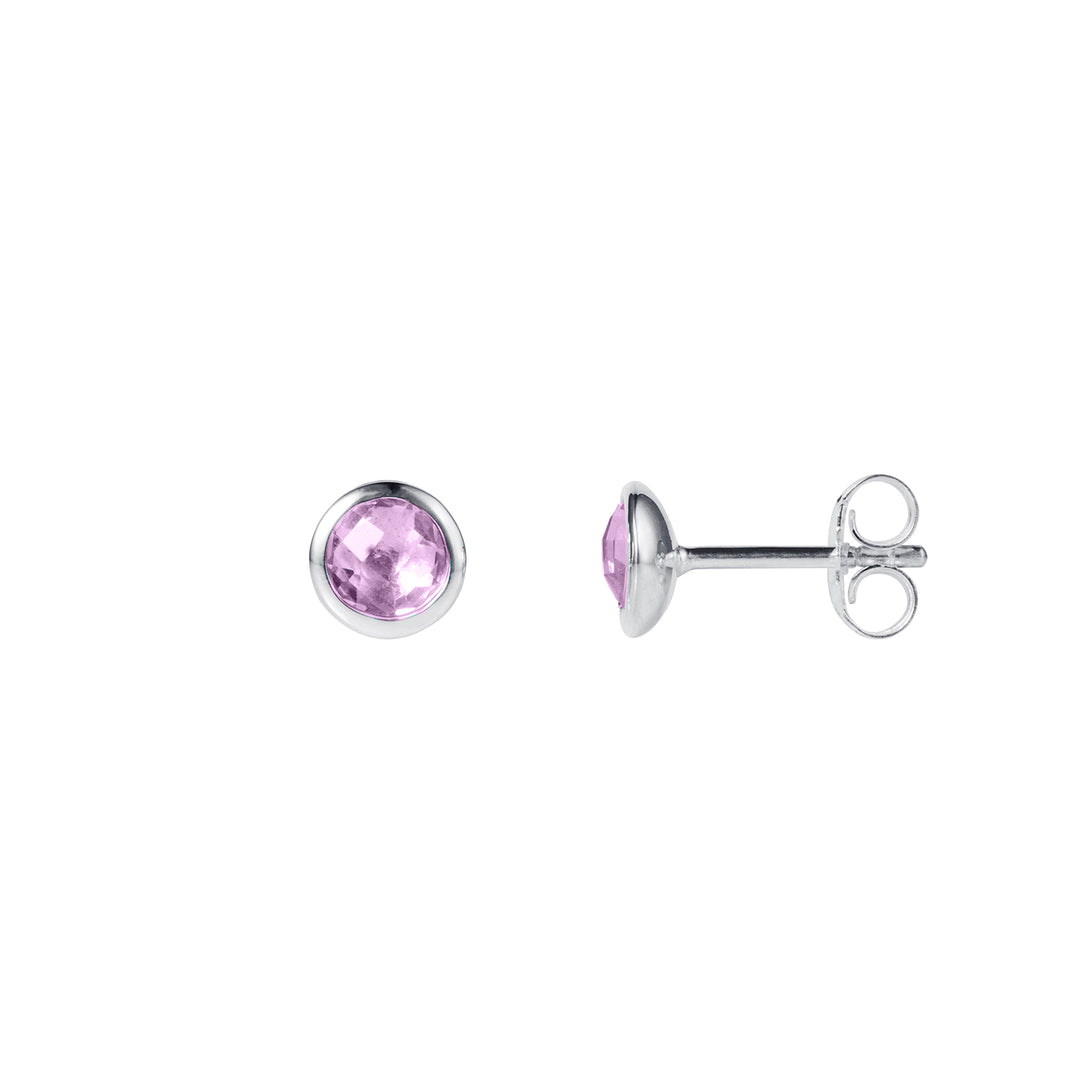 Round dainty silver stud earrings with purple amethyst gemstones on a white background