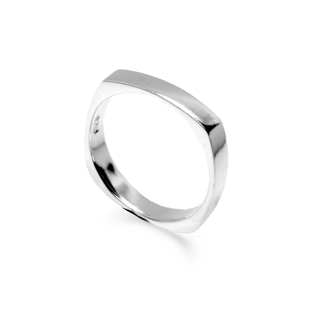 silver 4mm wide square band style ring on white background