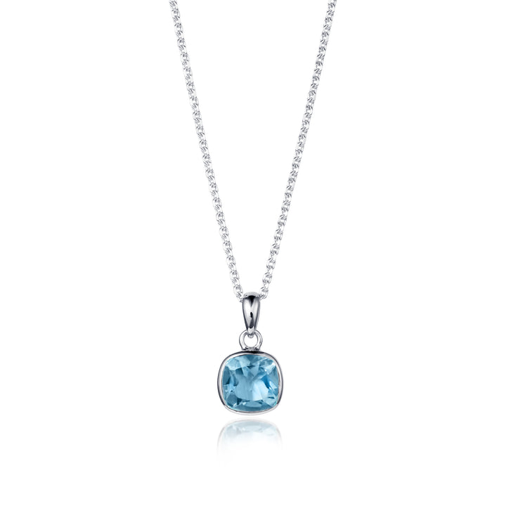 Necklace with a blue gemstone pendant on a white background