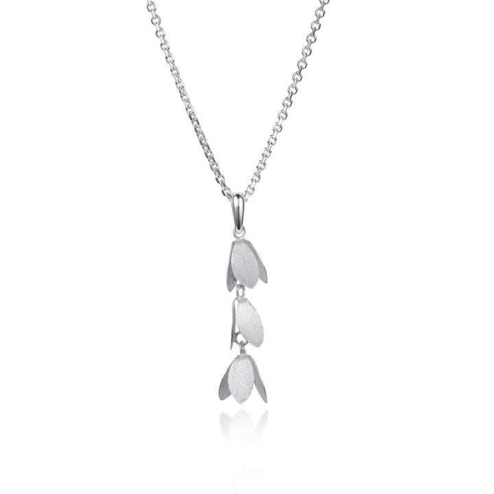 Silver pendant necklace with a catkin flower design on white background