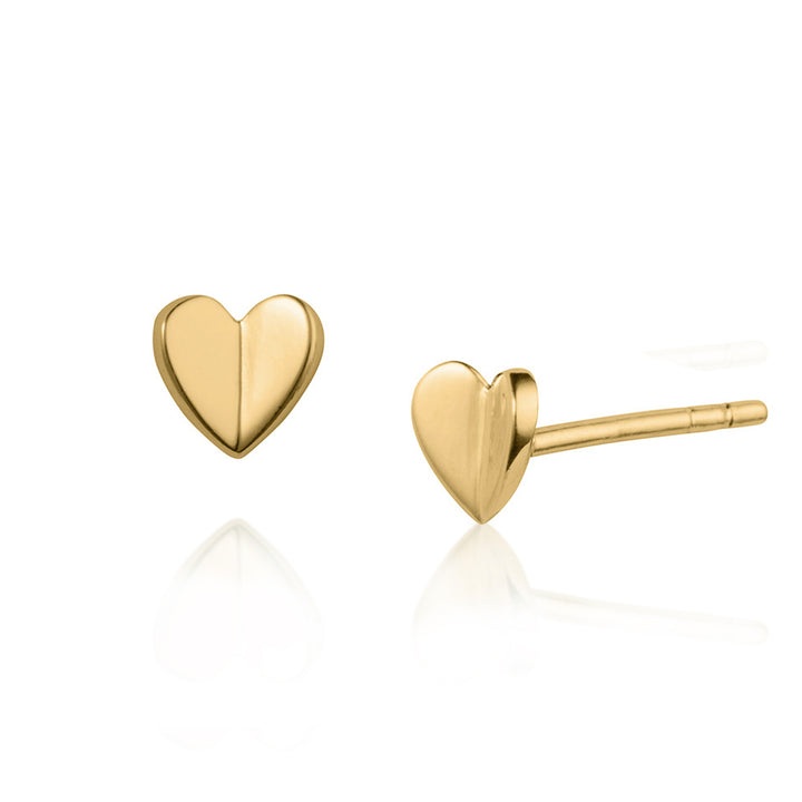 Gold heart-shaped earrings on a white background