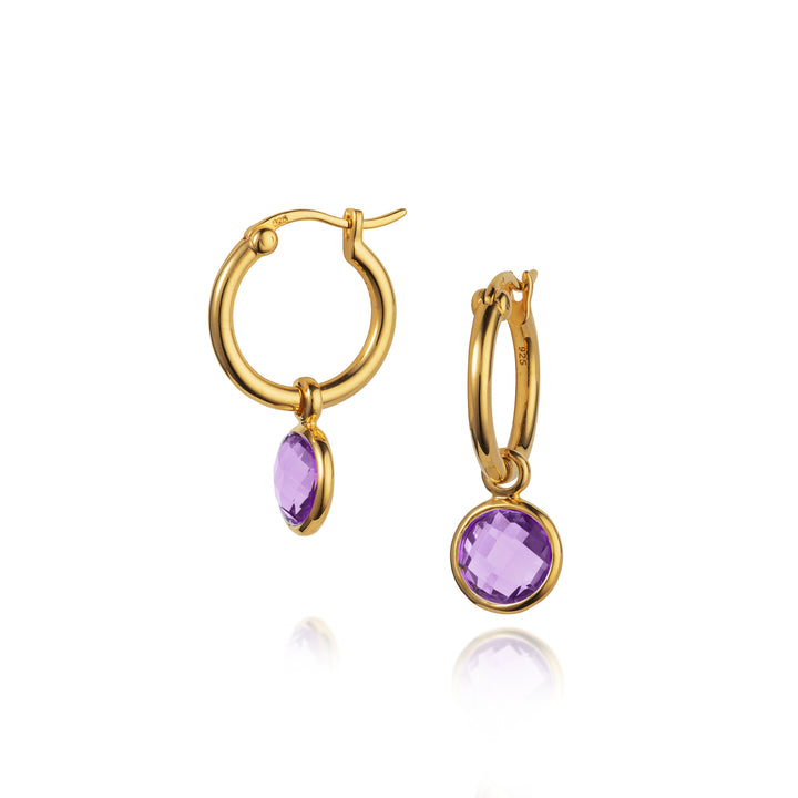 Gold snap-post hoop earrings with purple gemstones on a white background