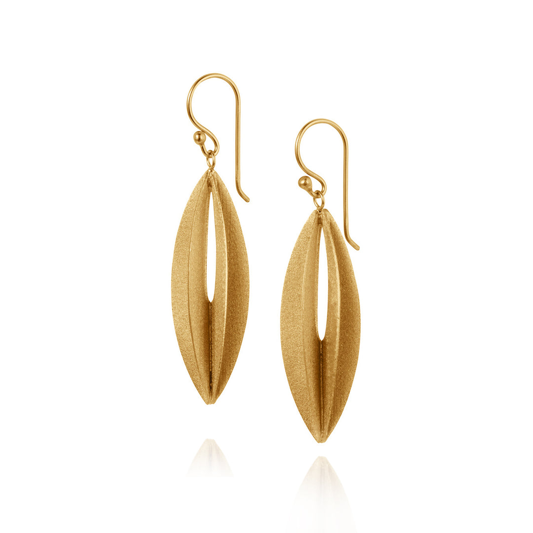 Gold modern design drop earrings on white background