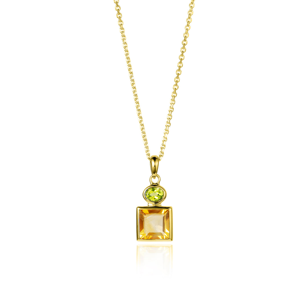 Gold necklace with a pendant featuring a square-cut citrine and oval peridot gemstone on a white background