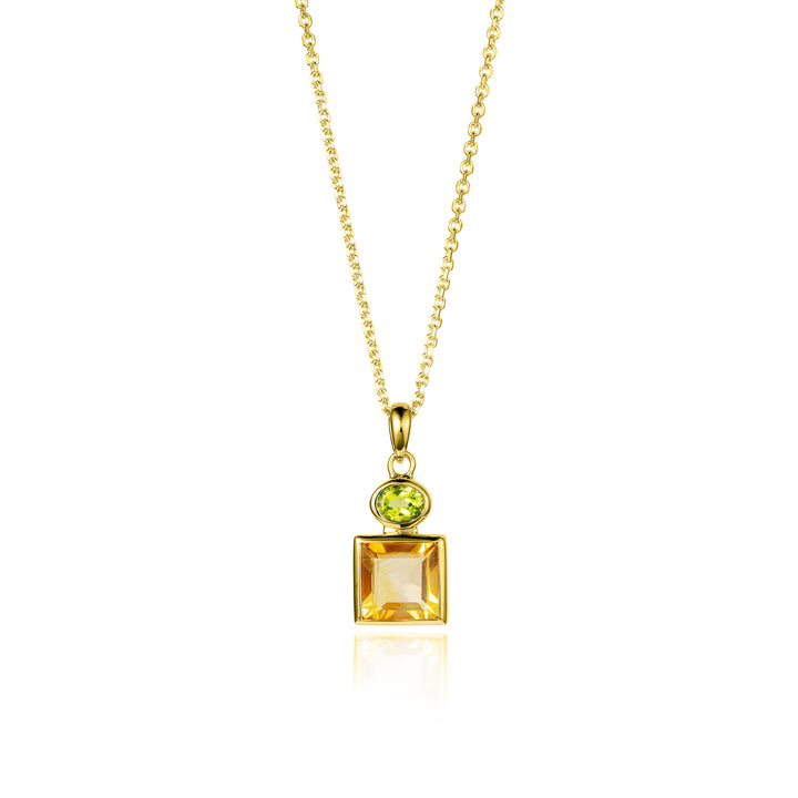Gold necklace with a pendant featuring a square-cut citrine and oval peridot gemstone on a white background