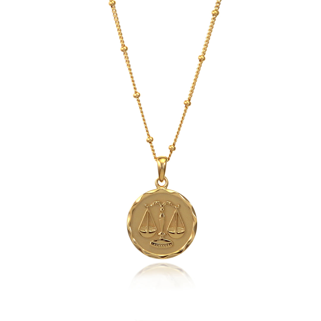 Gold Libra zodiac star sign necklace pendant with beaded chain