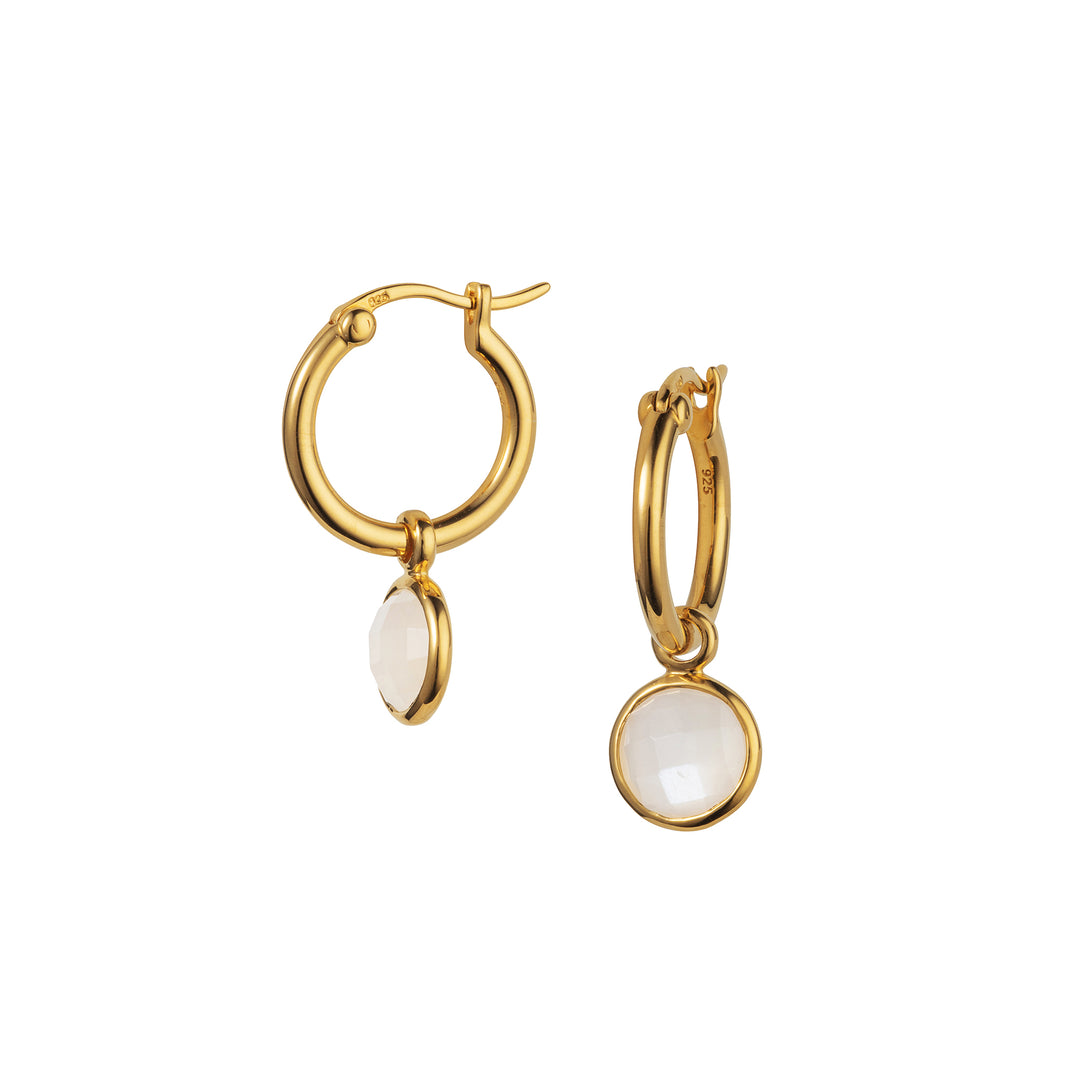 Gold snap-post hoop earrings with round moonstone drops on a white background.