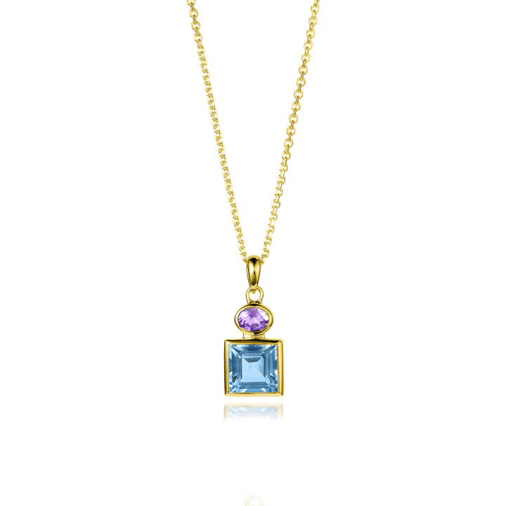 Gold necklace with a pendant featuring a square blue topaz and oval amethyst gemstone on a white background 