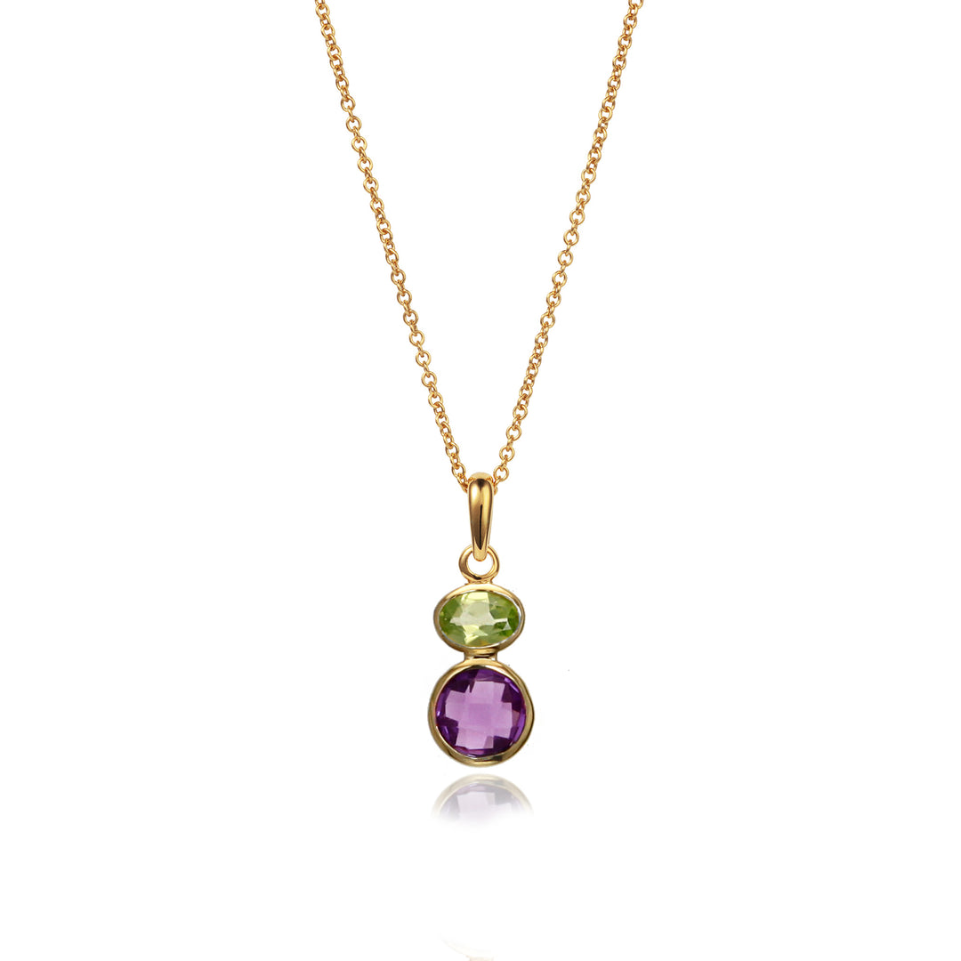 Gold necklace with amethyst and peridot gemstones on a white background