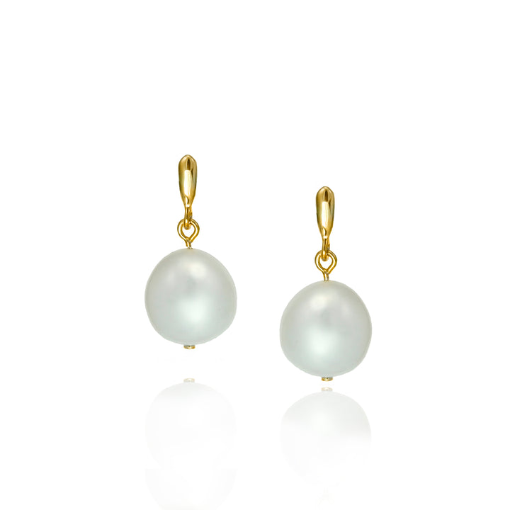 Pair of pearl earrings with gold drops on a white background