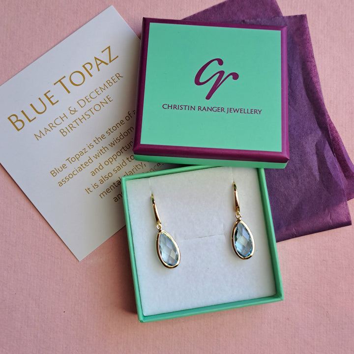 18ct gold vermeil pear drop earrings with blue topaz in Christin Ranger Jewellery