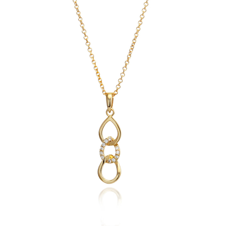 Gold necklace with a teardrop-shaped pendant with cubic zirconia pave on a white background