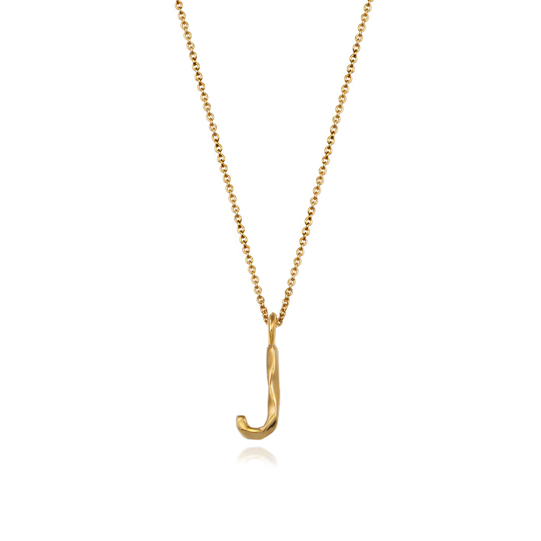 Gold vermeil letter J initial necklace pendant with chain on a white background.