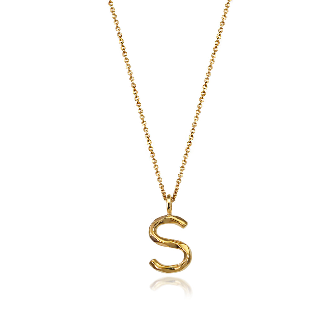 Gold vermeil letter S initial necklace pendant with chain on a white background.