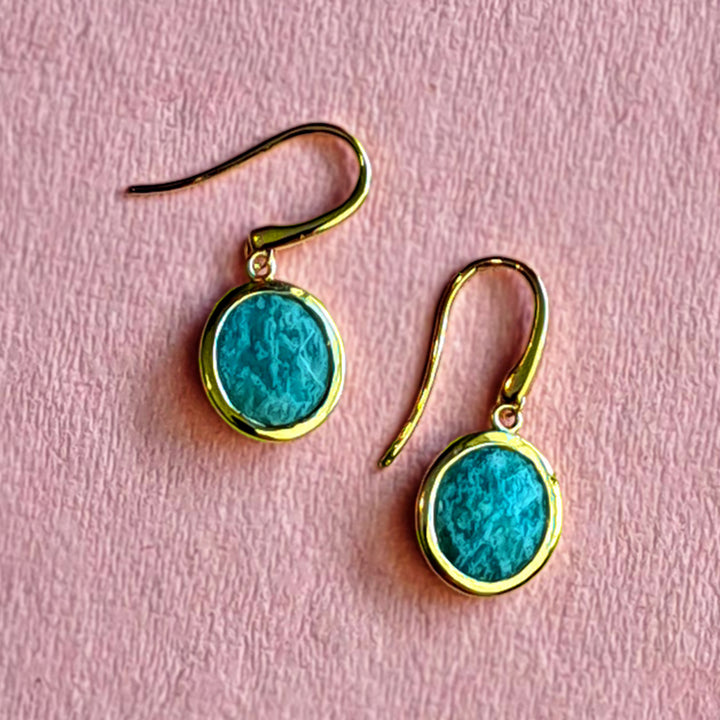 Gold vermeil oval drop earrings with amazonite on pink background