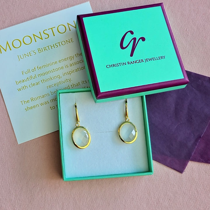 18ct gold vermeil oval drop earrings with white moonstone in Christin Ranger Jewellery  packaging