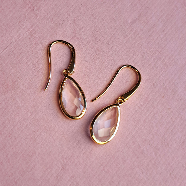 18ct gold vermeil pear drop earrings with rose quartz on alternative pink background