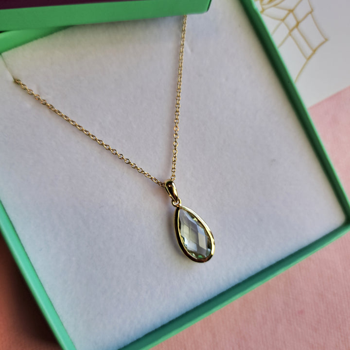 Close-up of a gold-vermeil-pear-drop-pendant-necklace-green-amethyst