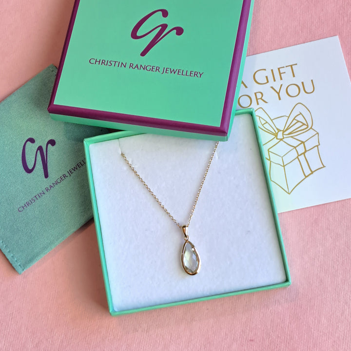 Gold-vermeil-pear-drop-pendant-necklace-green-amethyst on Christin Ranger Jewellery gift packaging