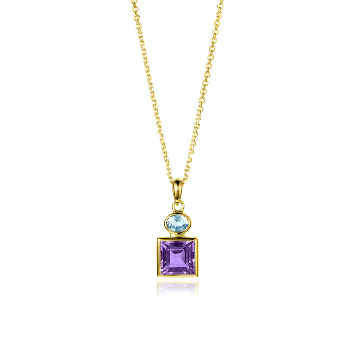 Gold necklace with purple and blue gemstone pendant on a white background