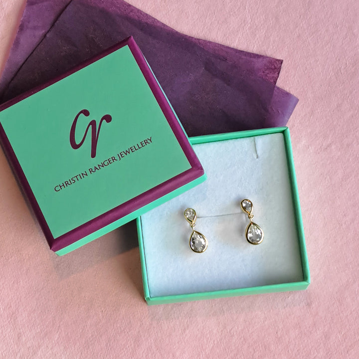 14ct gold vermeil two stone stud earrings with white topaz in a Christin Ranger Jewellery gift box