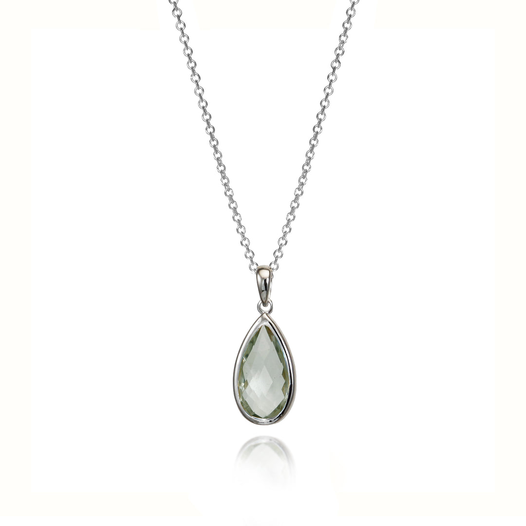 Silver teardrop-shaped pendant necklace with a pale green amethyst  gemstone on a white background