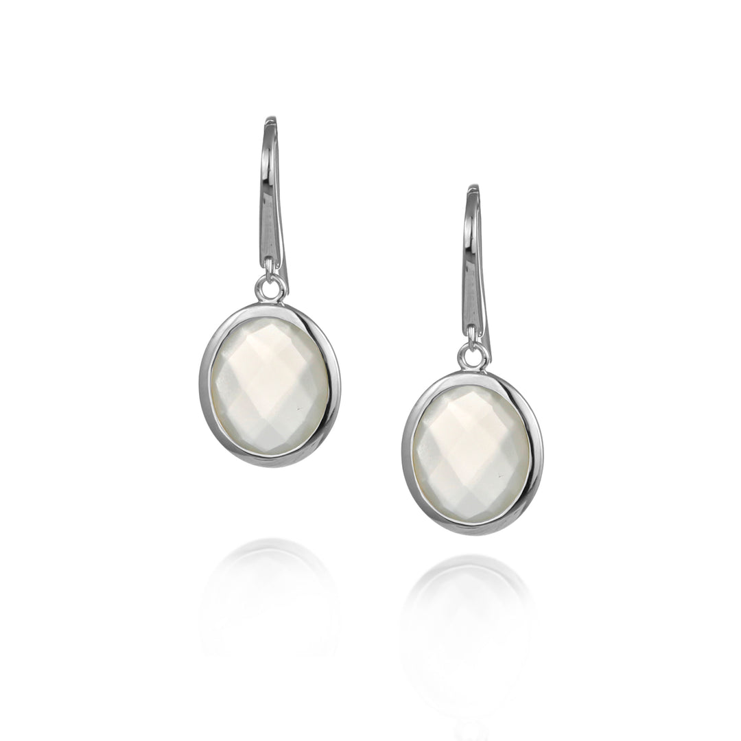 Silver moonstone earrings with white stone on a white background