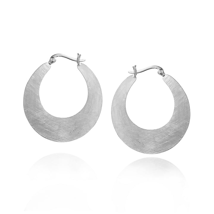 Silver flat hoop earrings on a white background