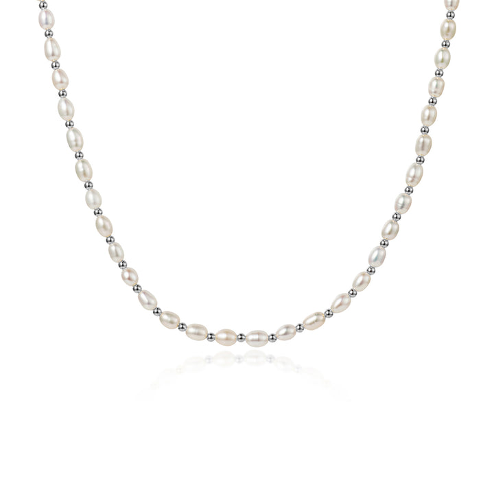 Freshwater seed pearl necklace with silver beads on a white background