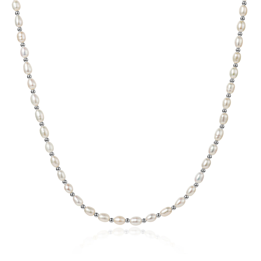 Pearl necklace with silver beads on a white background