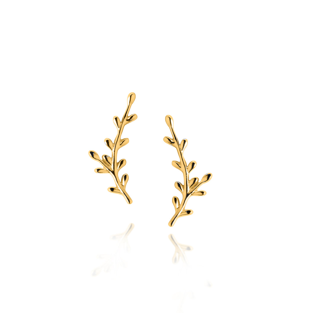 Gold leaf-shaped post earrings on a white background
