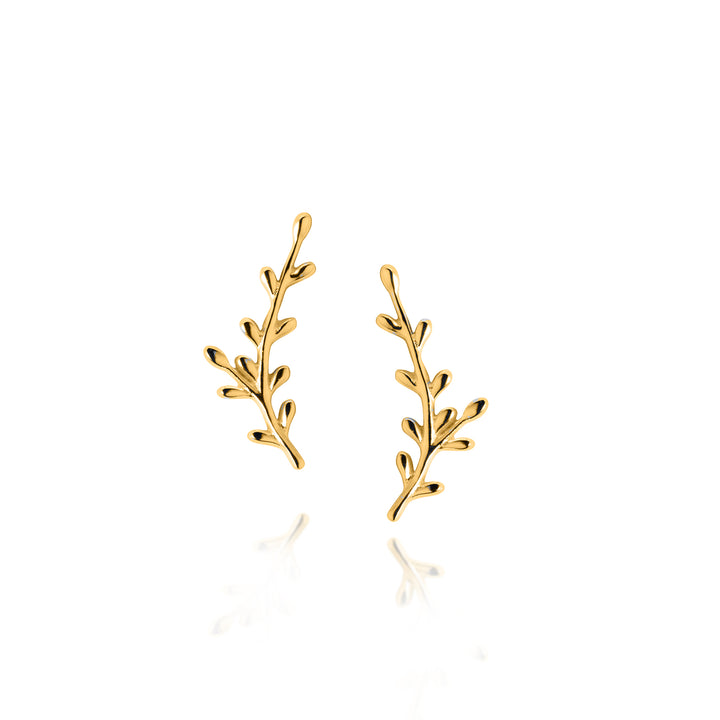 Gold leaf-shaped post earrings on a white background