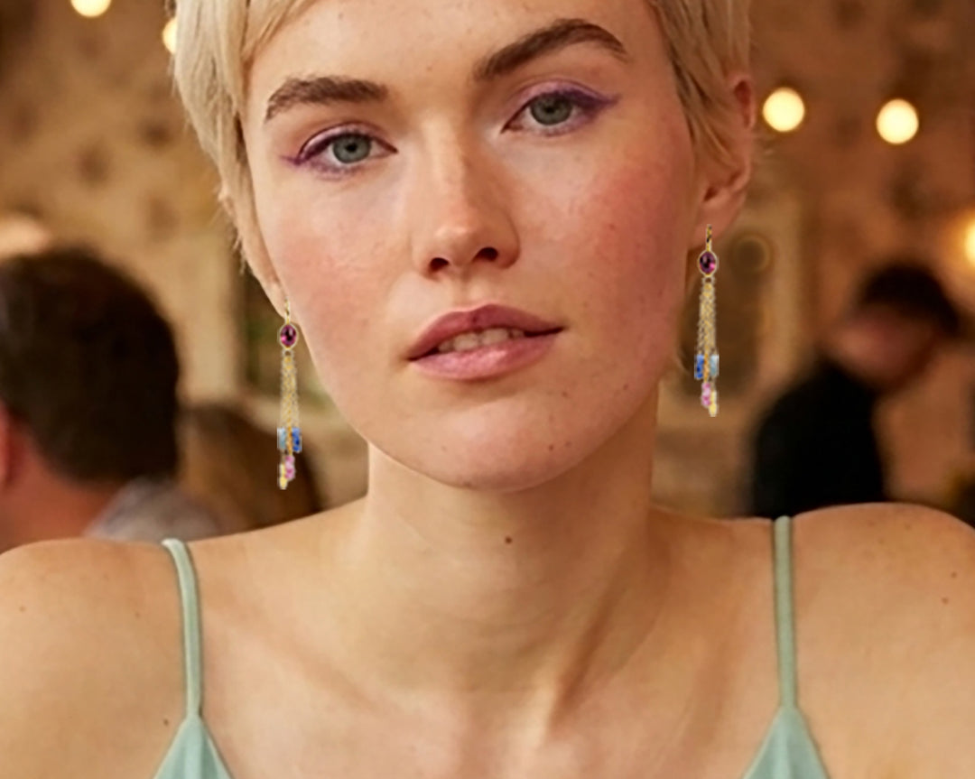 Woman wearing pink tourmaline chandelier drop earrings in gold vermeil