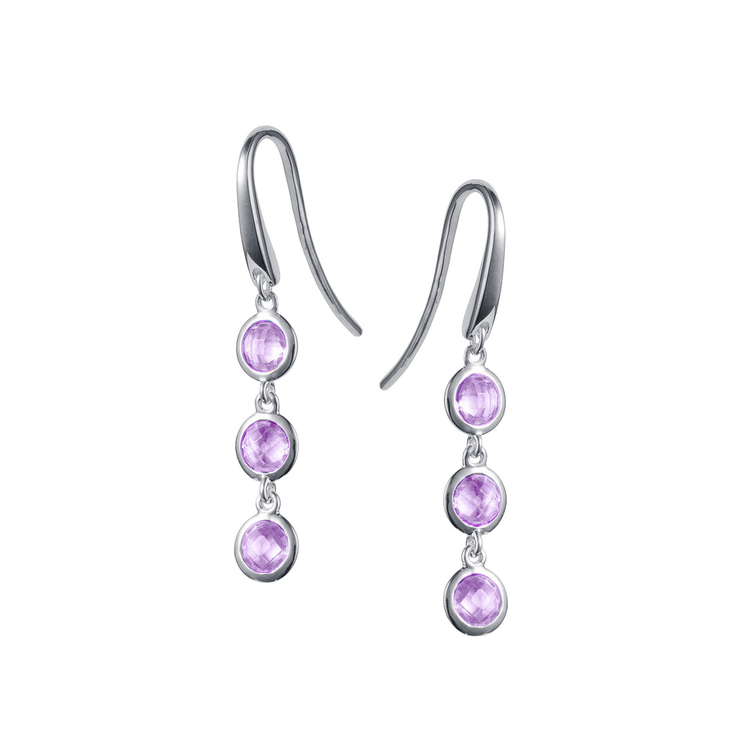 Silver triple stone hook earrings with purple amethyst gemstones on a white background