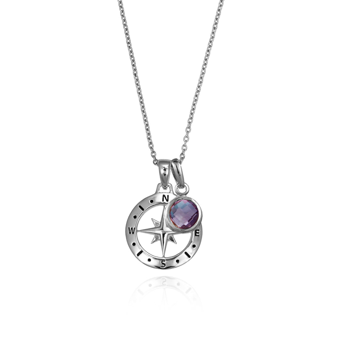 Silver compass necklace with an purple amethyst charm pendant and chain on a white background