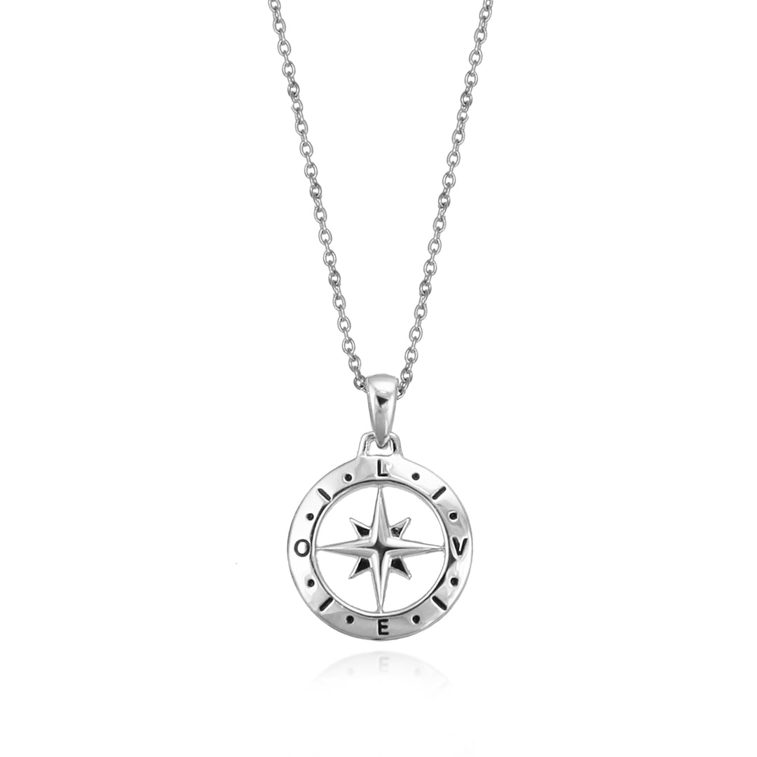 Silver compass necklace with the word love spelled out against a white backgrund