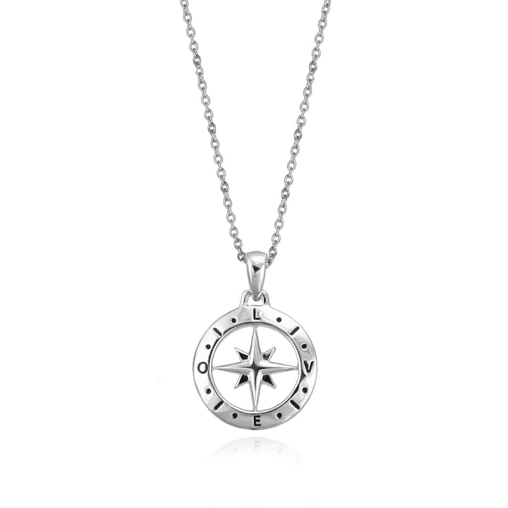 Silver compass necklace with the word love spelled out against a white backgrund