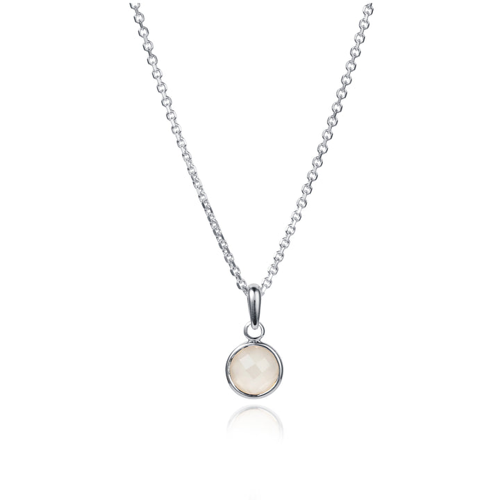 Dainty silver necklace and chain set with a  faceted moonstone gemstone.