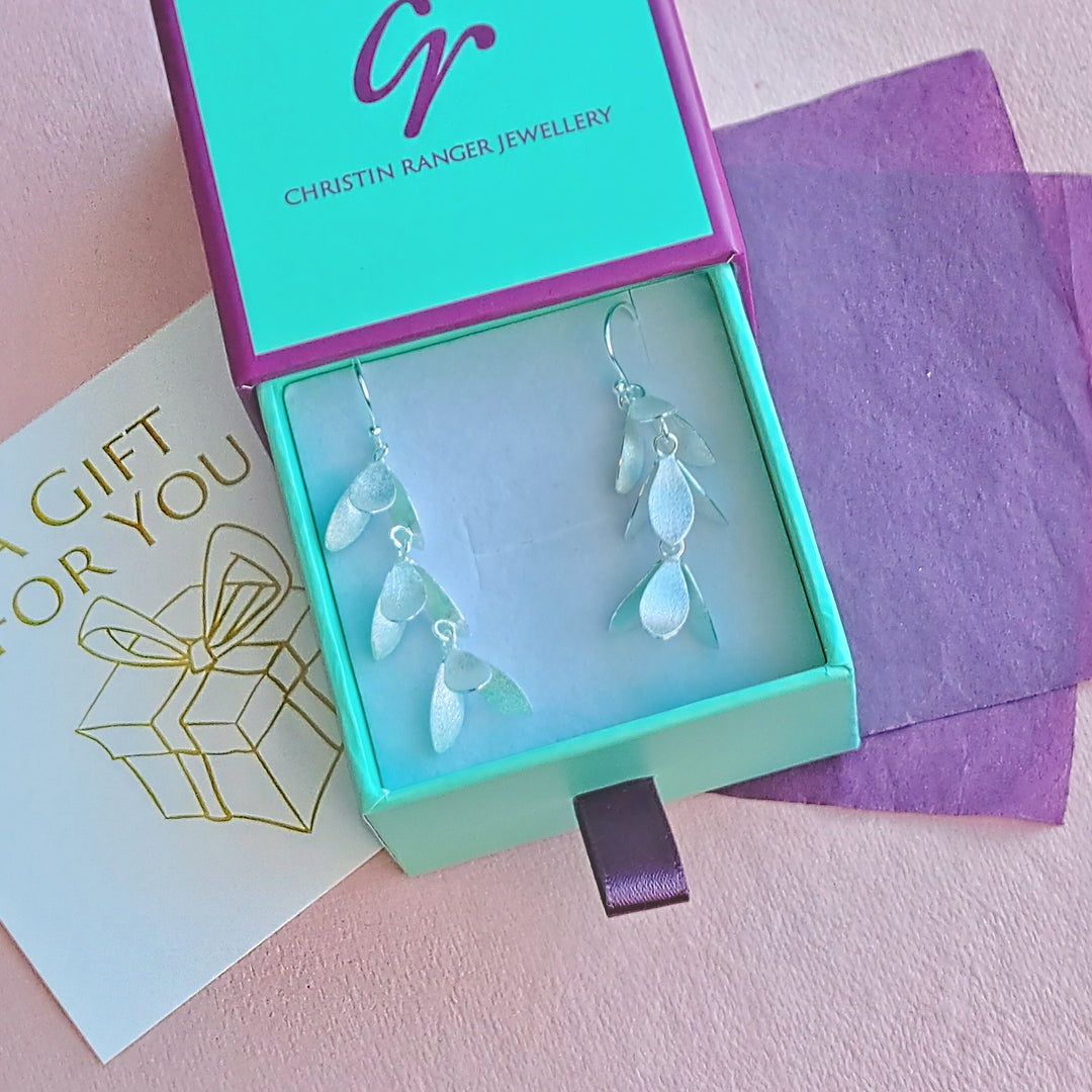 Silver drop earrings in a Christin Ranger Jewellery branded gift drawer with tissue paper and gift note.