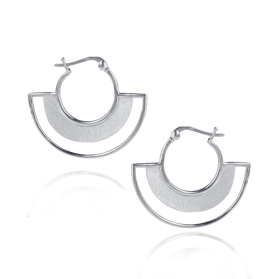 Silver hoop earrings with a geometric design on a white background