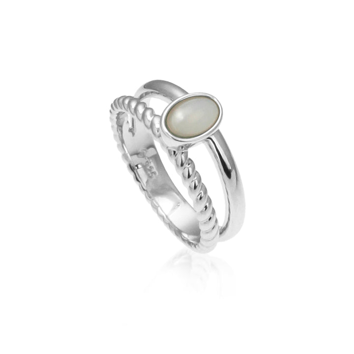 Silver double band ring with an oval moonstone  on a white background