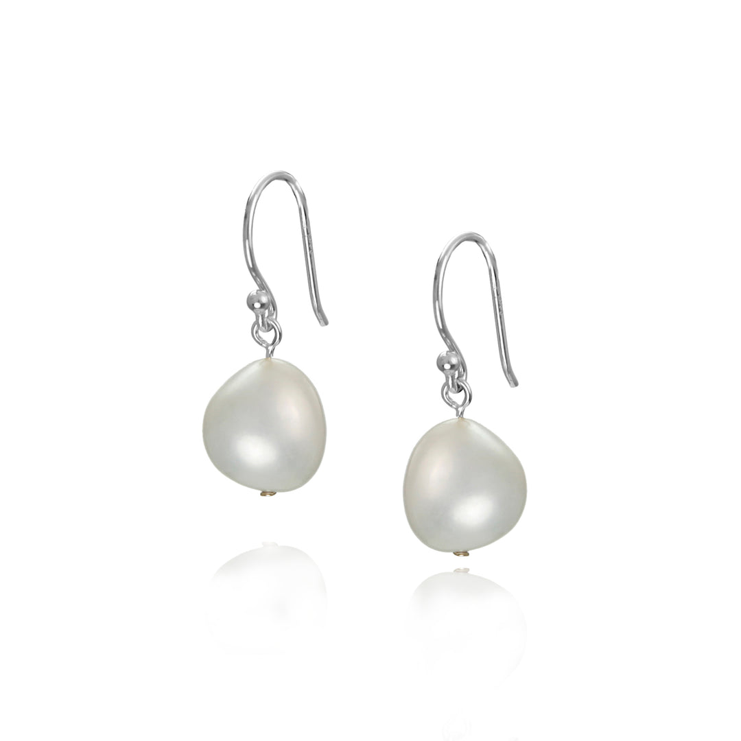 Pearl earrings with silver hooks on a white background